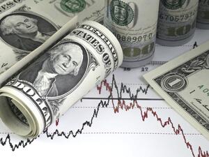 الدولار  يتجه نحو أقل مستوى في شهر