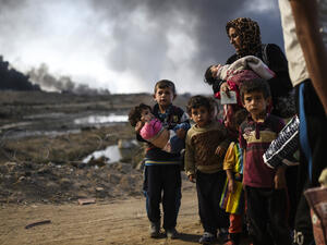 Some of the Iraqi people being displaced in their homes in Nineveh province. /AFP