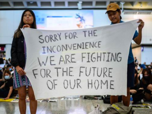 Students stage an airport sit-in, before new restrictions in Hong Kong /AFP