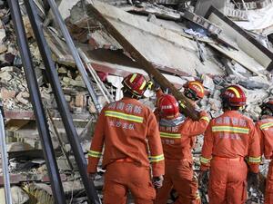 Sixth Survivor Pulled From China Building Collapse, Dozens Missing (AFP)