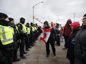 Police and COVID Protesters on US-Canada Bridge Clash