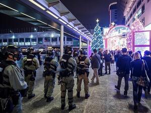 Anti-government demonstrators protest on Christmas Eve in Hong Kong, China.