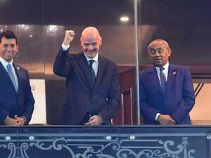 Fifa President Gianni Infantino (C) reacts next to CAF President Ahmad Ahmad (R) and Egyptian Youth and Sports minister Ashraf Sobhy ahead of 2019 AFCON final between Senegal and Algeria at the Cairo International Stadium on July 19, 2019