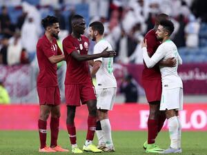  Qatar's players shake hands and embrace with Saudi's after the 24th Arabian Gulf Cup semi-final football match between Saudi Arabia and Qatar at al-Janoub Stadium in the Qatari capital Doha