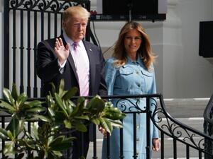 US President Donald Trump walks with First Lady Melania Trump in Washington, DC on April 22, 2019.  MANDEL NGAN / AFP