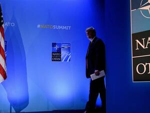 US President Donald Trump arrives for a press conference on the second day of the North Atlantic Treaty Organization (NATO) summit in Brussels on July 12, 2018. (AFP)