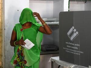 An Indian woman leaves after casting her vote during the third phase of general elections at a polling station in Ahmedabad on April 23, 2019. (AFP/ File)