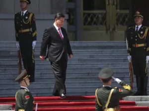 China's President Xi Jinping (C) arrives to attend a welcoming ceremony for Mongolia's President Khaltmaagiin Battulga (not pictured) at the Great Hall of People in Beijing on April 25, 2019. (AFP)