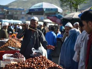 An Afghan street vendor sells dates ahead of the holy month of Ramadan at a roadside stall in a market in Kabul on May 5,2019. (AFP/ File)