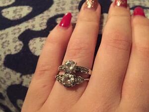 A bride-to-be was publicly 'ring-shamed' after admitting she wears two bands - because her fiancé couldn't choose between them. (Facebook)