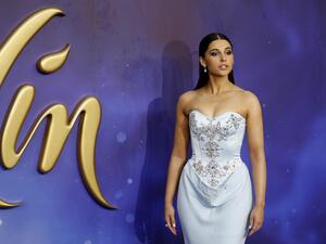 British actress Naomi Scott poses on arrival for the European Gala of Aladdin in central London on May 9, 2019. (Tolga AKMEN / AFP)