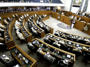 Kuwaiti members of parliament attend the opening session of a new parliamentary term in Kuwait City [YASSER AL-ZAYYAT/AFP/Getty Images]