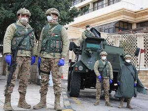 Jordanian army units occupy a checkpoint (AFP/FILE) banner image