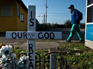 A grave questioning God's existence stands in West Virginia (AFP/FILE)  banner image