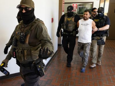 ICE agents conducting an arrest
