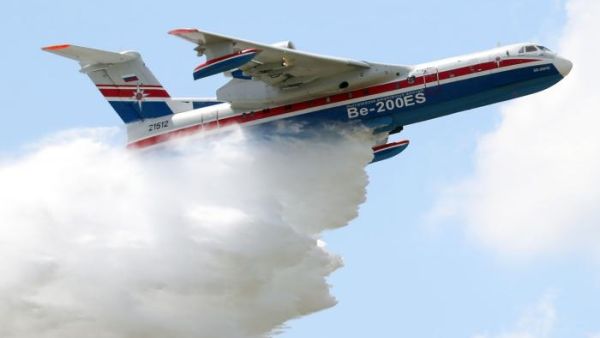 A Russian Beriev BE 200 amphibious aircraft performs a demonstration flight on the opening day of the 54th International Paris Air Show at Le Bourget.