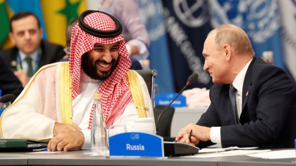 Mohammed bin Salman and Vladimir Putin at a working session of leaders at the G20 summit in Osaka, Japan.
