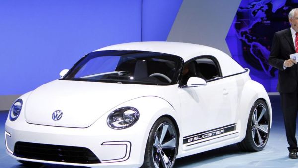 Dr. Ulrich Hackenberg, board member in charge of development of Volkswagen Group, introduces the new VW Beetle at the 2012 North American International Auto Show at the Cobo Center in Detroit, January 9, 2012.
