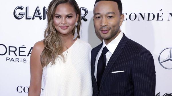 Chrissy Teigen and John Legend will be featured on Season 31 of The Simpsons File Photo by Jason Szenes UPI License Photo