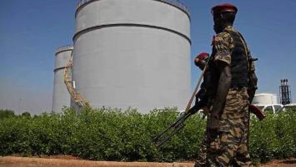 South Sudanese soldiers guard an oil refining facility.