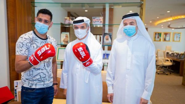 Amir Khan (left) seen with Saeed Hareb, secretary general of DSC and Nasser Aman Al Rahma, assistant secretary general of DSC to discuss his future projects. (Supplied photo)