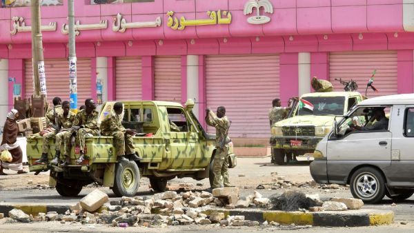 Sudanese soldiers stand guard a street in Khartoum on June 9, 2019. Sudanese police fired tear gas Sunday at protesters taking part in the first day of a civil disobedience campaign. (AFP/ File Photo)