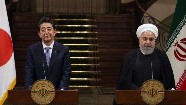 Iranian President Hassan Rouhani (R) and Japanese Prime Minister Shinzo Abe, give a joint press conference at the Saadabad Palace in the Iranian capital Tehran on June 12, 2019. (AFP/ File)
