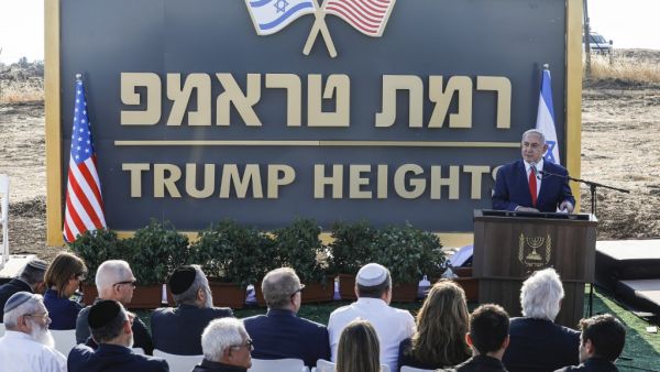 Israeli Prime Minister Benjamin Netanyahu gives a speech before the newly-unveiled sign for the new settlement of "Ramat Trump", or "Trump Heights" in English, named after the incumbent US President during an official ceremony in the Israeli-annexed Golan Heights on June 16, 2019. (AFP/ File Photo)