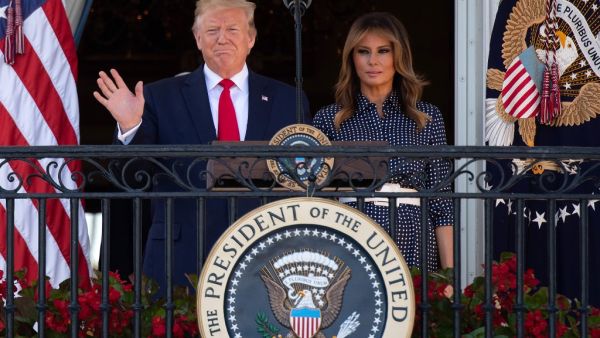 US President Donald Trump speaks alongside First Lady Melania Trump during the Congressional Picnic on the South Lawn of the White House in Washington, DC, June 21, 2019. (SAUL LOEB / AFP)