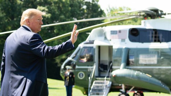 US President Donald Trump walks to Marine One prior to departing from the South Lawn of the White House in Washington, DC, June 22, 2019, as he travels to Camp David, Maryland. (SAUL LOEB / AFP)