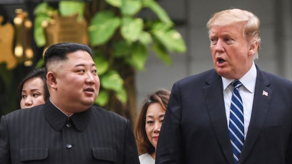 US President Donald Trump (R) walks with North Korea's leader Kim Jong Un during a break in talks at the second US-North Korea summit at the Sofitel Legend Metropole hotel in Hanoi on February 28, 2019. (AFP/ File Photo)