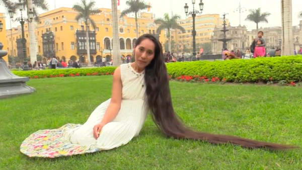 Noemi Elizabeth Romero Huaman, 24, dubbed the "Peruvian Rapunzel," said she has been growing out her hair since she was born. (YouTube screenshot