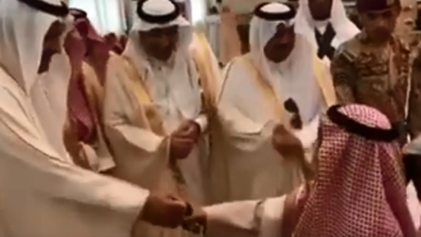 The moment Saudi prince gave the child his watch which is it's probably quite expensive. (Youtube screenshot)