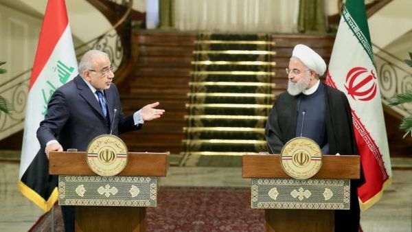 Iranian President Hassan Rouhani, right, and Iraqi Prime Minister Adel Abdul Mahdi speak at news conference in Iranian capital Tehran. ( AFP)
