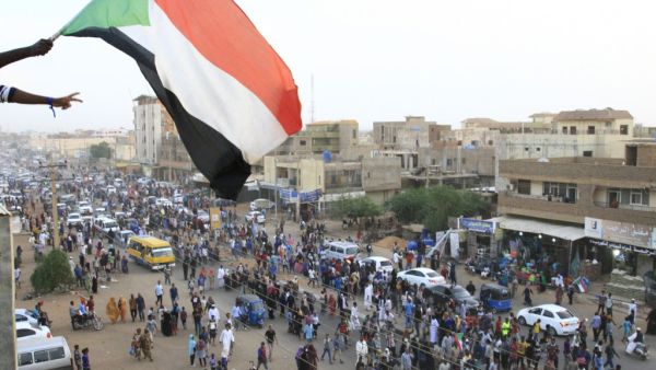 Crowds of protesters were violently dispersed by men in military fatigues in a pre-dawn raid on a protest site outside army headquarters on June 3. (EBRAHIM HAMID / AFP)