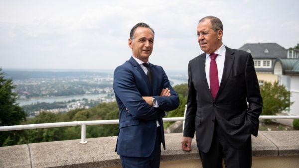 German Foreign Minister Heiko Maas and Russian Foreign Minister Sergey Lavrov pose ahead the German-Russian forum "Petersburg Dialogue" at the Steigenberger Grandhotel Petersberg on July 18, 2019 in Koenigswinter near Bonn, western Germany.  Marius Becker / POOL / AFP