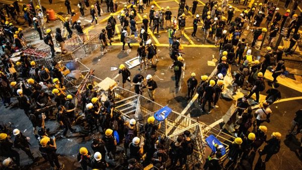 Protesters build an improvised road block after a march against a controversial extradition bill in Hong Kong on July 21, 2019. (AFP/ File Photo)