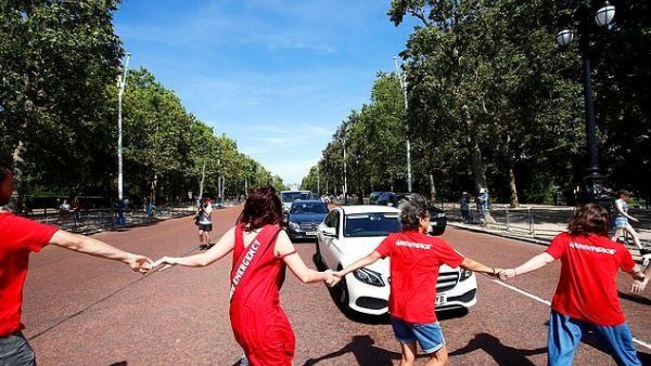 Boris Johnson’s car is forced to swerve around climate protesters (Twitter)