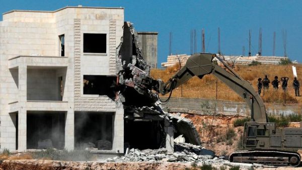 First Israel militarily occupies the land, then it builds a repulsive apartheid wall, then it decides to demolish Palestinian homes built on Palestinian land (Twitter)
