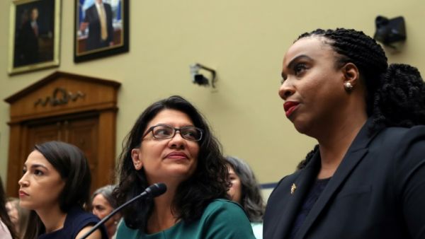 Representatives Alexandria Ocasio-Cortez (L) Rashida Tlaib (C) and Ayanna Pressley (R) hit back at a series of tweets from President Donald Trump. (AFP/ File Photo)