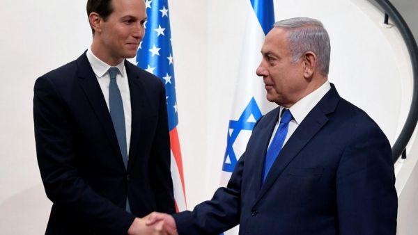 US presidential adviser Jared Kushner shakes hands with Israeli Prime Minister Benjamin Netanyahu in Jerusalem on 30 May (AFP)