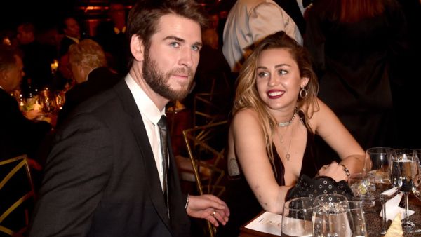 Liam Hemsworth and Miley Cyrus. (AFP)