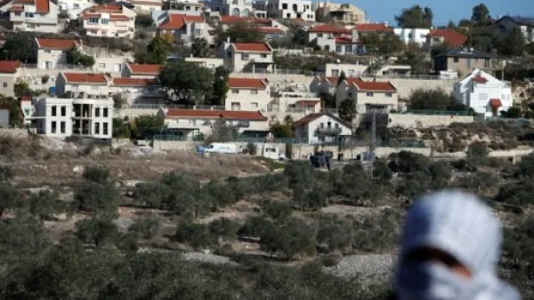 A Palestinian protestor in front of the Israeli settlement of Qadumim (Kedumim), near Nablus, in the occupied West Bank. (AFP/ File Photo)