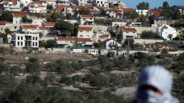 A Palestinian protestor in front of the Israeli settlement of Qadumim (Kedumim), near Nablus, in the occupied West Bank. (AFP/ File Photo)
