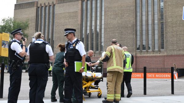 Police, paramedics and fire crews are seen outside the Tate Modern gallery in London on August 4, 2019 after it was put on lock down and evacuated after an incident involving a child falling from height and being airlifted to hospital. (AFP/ File Photo)