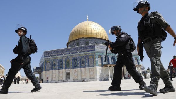 Israeli security forces walk past the Dome of the Rock mosque as they arrive at the Al-Aqsa mosques compound in the Old City of Jerusalem on August 11, 2019. (AFP/ File Photo)