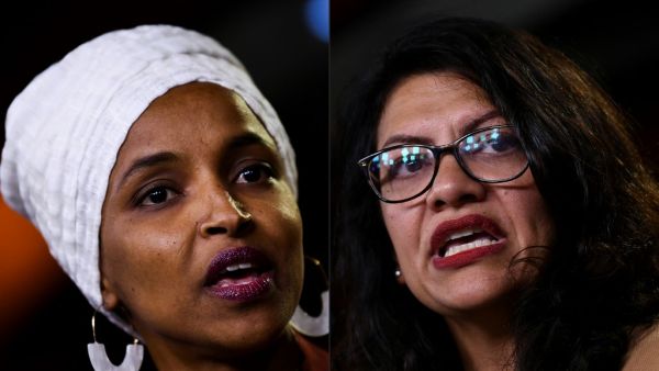 Democrat US Representatives Ilhan Abdullahi Omar (L) and Rashida Tlaib during a press conference, to address remarks made by US President Donald Trump earlier in the day, at the US Capitol in Washington, DC on July 15, 2019. (AFP/ File Photo)