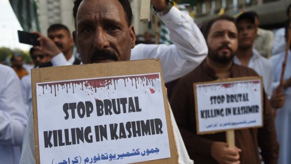 Pakistanis demonstrators hold placards during an anti-Indian protest in Karachi on August 18, 2019. (AFP/ File Photo)