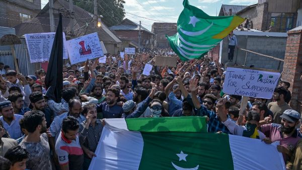 Kashmiri Muslims shout anti-Indian slogans during a protest at Anchar Soura locality of Srinagar on August 23, 2019. (AFP)
