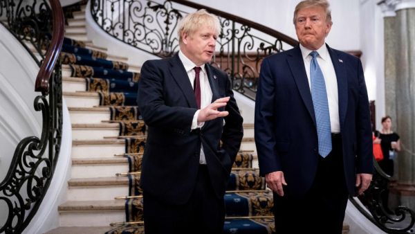 US President Donald Trump (R) and Britain's Prime Minister Boris Johnson speak before a working breakfast at the G7 Summit in Biarritz, France on August 25, 2019. (AFP/ File Photo)